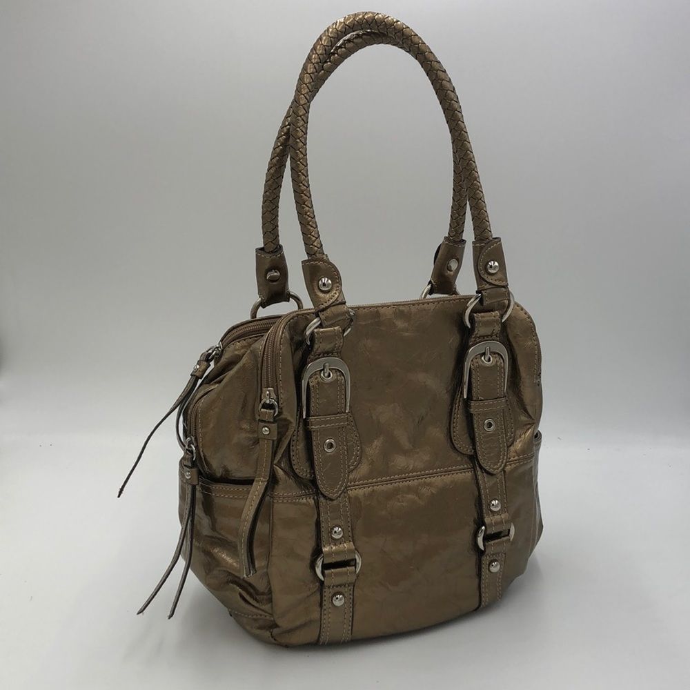 Shiny Gold shoulder bag by New Directions. 3 large compartments w/zip enclosures